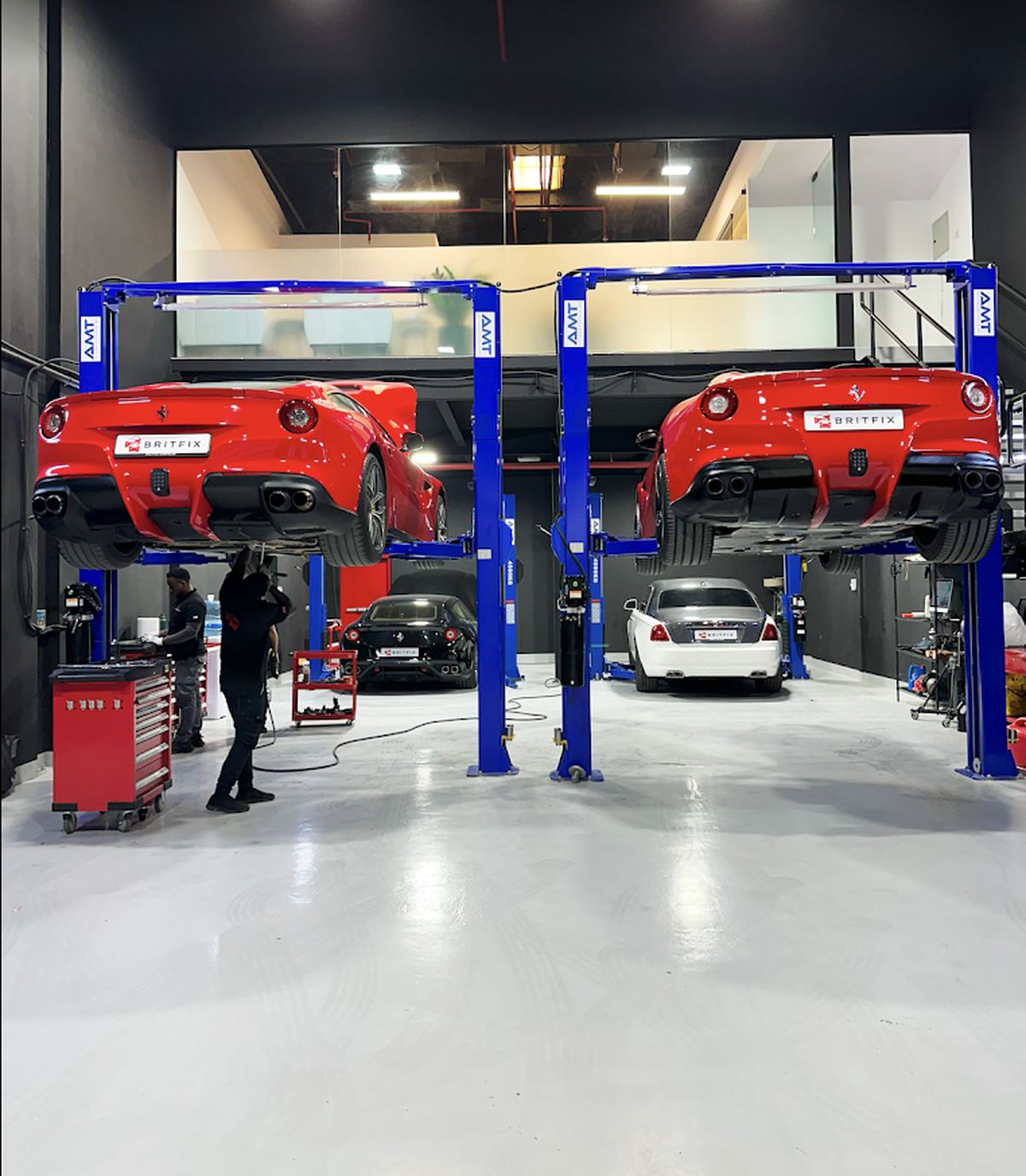 Britfix Auto Repair workshop in Al Quoz Dubai with cars on lifts